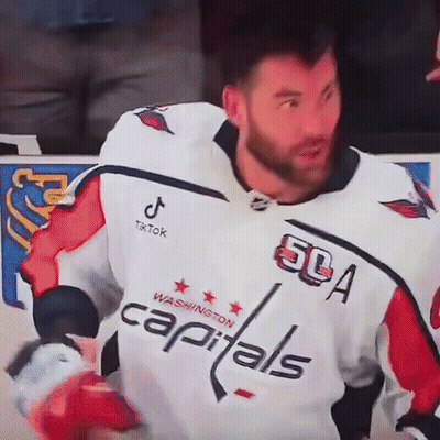 Man In Capitals Jersey On Hockey Rink GIF
