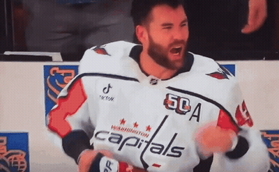Man In Capitals Jersey Standing On Ice GIF
