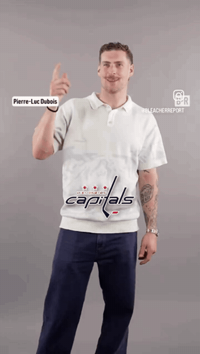 Man in Capitals Shirt Thumbs Up