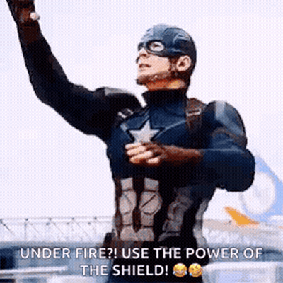 Man In Captain America Costume Arms Outstretched GIF