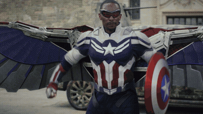 Man In Captain America Costume Holding Shield GIF