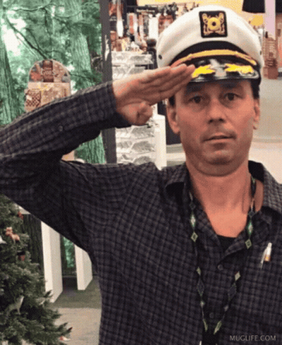 Man In Captain Hat Saluting Muglife.com GIF