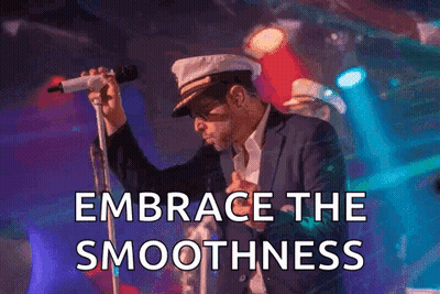 Man In Captain Hat Singing Embrace The Smoothness GIF