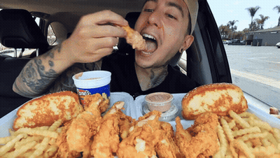Man In Car Eating Fried Chicken And French Fries GIF