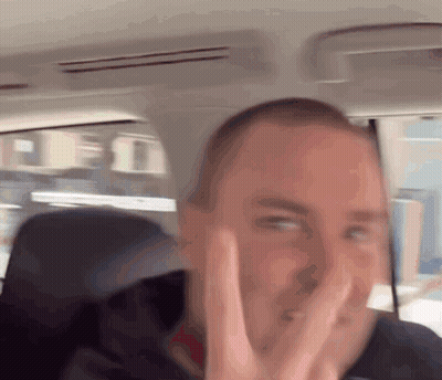 Man In Car Making Peace Sign GIF