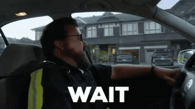 Man In Car Saying Wait GIF