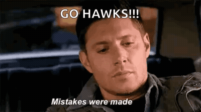 Man In Car With Go Hawks Mistakes Were Made On Face GIF