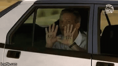 Man In Car With Hands Painted Aiu To GIF