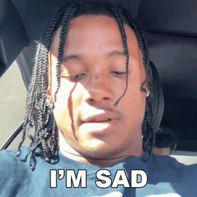 Man In Car With I'm Sad On Shirt GIF