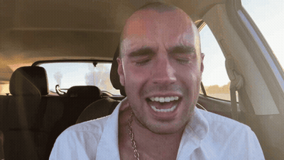 Man In Car With Mouth Open GIF