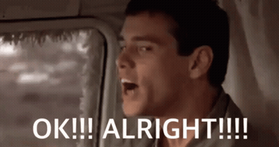 Man In Car With Mouth Open Saying Ok Alright GIF