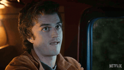 Man In Car With Netflix Logo GIF