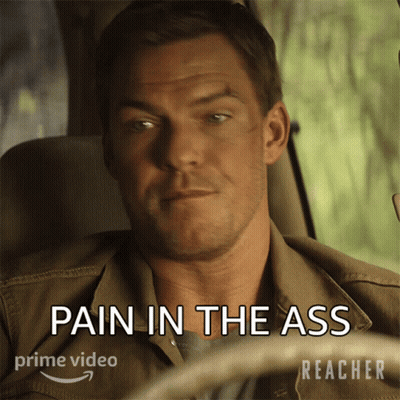 Man In Car With Pain In The Ass GIF