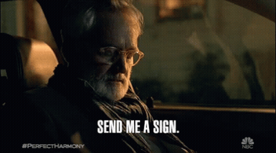 Man In Car With Send Me A Sign GIF