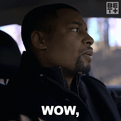 Man In Car With Wow On Screen GIF