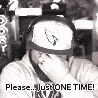Man In Cardinals Hat Covering Face With Hand GIF