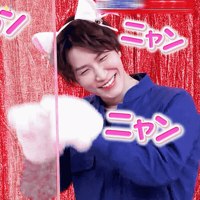 Man In Cat Ear Headband Holding Cat Paw GIF