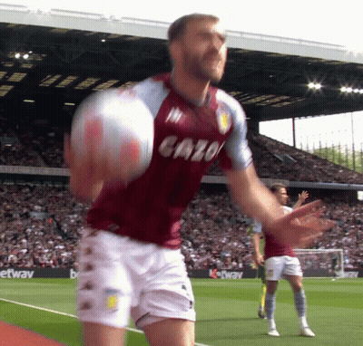 Man In Cazo Jersey Holding Ball GIF