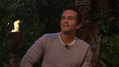 Man In CBS Logo Shirt Smiling GIF