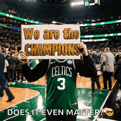 Man In Celtics Jersey Holding We Are The Champions Sign GIF