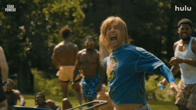 Man In Chad Powers Shirt Throwing Frisbee GIF