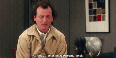 Man In Chair As Long As I'm In My Apartment I'm Ok GIF