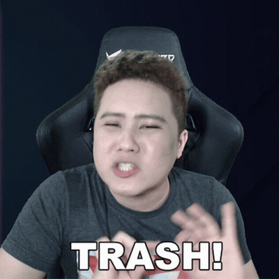 Man In Chair Making Funny Face Saying Trash GIF