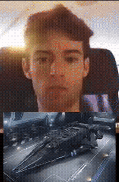 Man In Chair Next To Spaceship Picture GIF