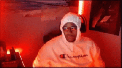 Man In Champion Hoodie And Headphones GIF