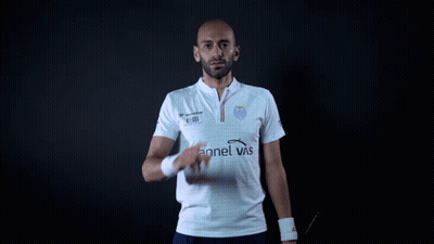 Man In Channel Vis Shirt Shushing GIF