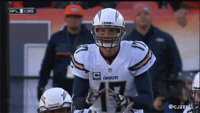 Man In Chargers Jersey Looking At Camera GIF