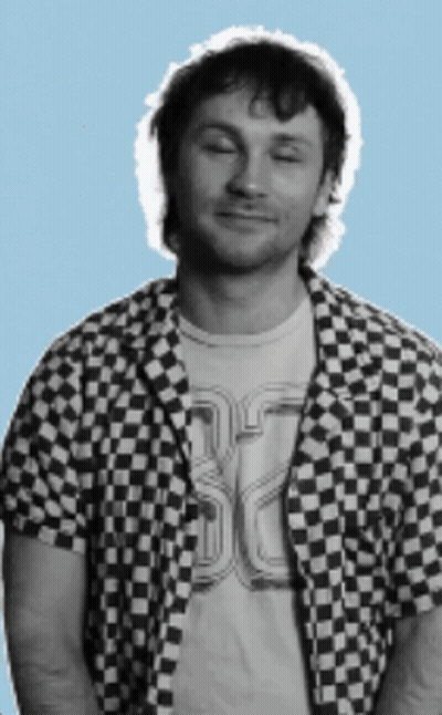 Man In Checkered Shirt With SD T-Shirt GIF