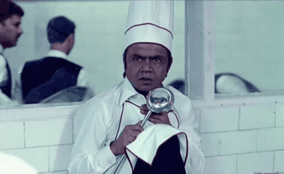 Man in Chef's Hat Holding Ladle