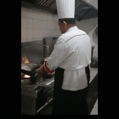 Man In Chef's Hat Preparing Food GIF
