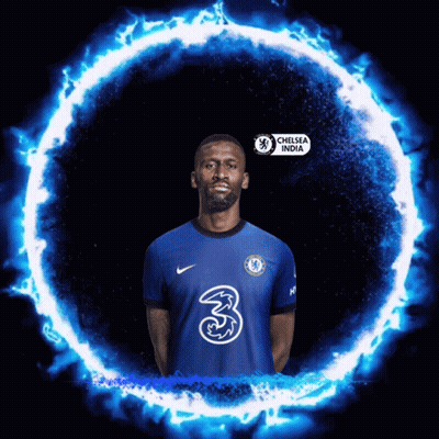 Man In Chelsea India Jersey In Front Of Blue Circle Of Fire GIF