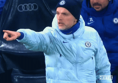Man In Chelsea Jacket And Beanie Pointing GIF