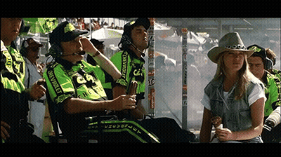 Man In Chevrolet Shirt Sitting In Chair GIF