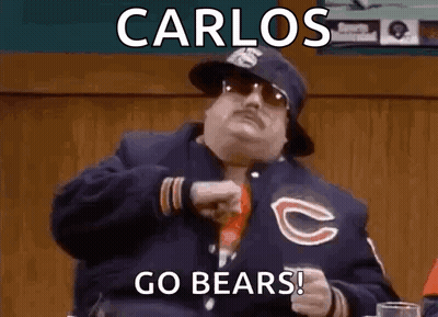 Man in Chicago Bears Jacket Pointing Saying Go Bears