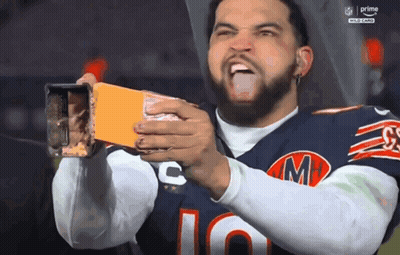 Man In Chicago Bears Jersey Holding Box Of Cheese GIF