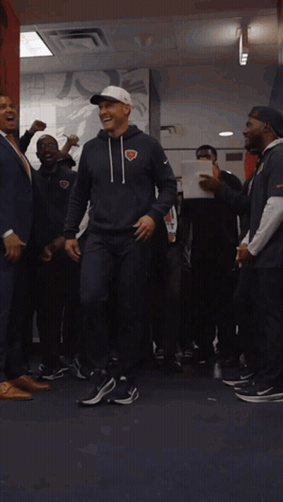 Man In Chicago Bears Sweatshirt In Locker Room GIF