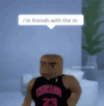 Man In Chicago Jersey Standing In Room With Plant GIF