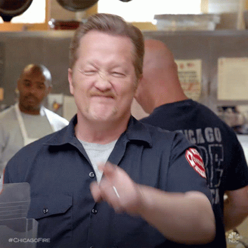 Man In Chicago Shirt Making A Face GIF