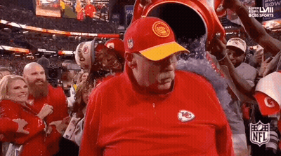 Man In Chiefs Hat Doused With Water By Crowd GIF