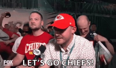 Man In Chiefs Hat Saying Let's Go Chiefs In Crowd GIF