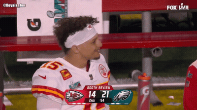 Man In Chiefs Jersey Sitting In Dugout GIF