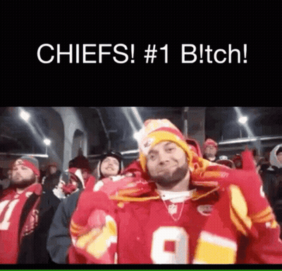 Man In Chiefs Jersey Standing In Crowd GIF