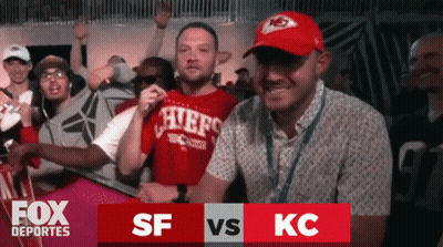 Man In Chiefs Shirt Surrounded By Fans GIF