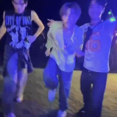 Man In City Of Angels Shirt Dancing With Two Other Men GIF