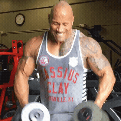 Man In Clay Tank Top Lifting Dumbbells GIF