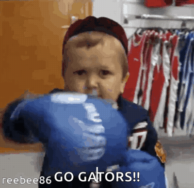 Man In Clemson Sweatshirt And Headphones In Front Of Crowd GIF